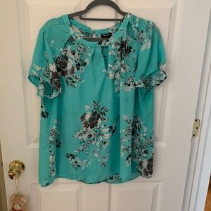 Green floral blouse